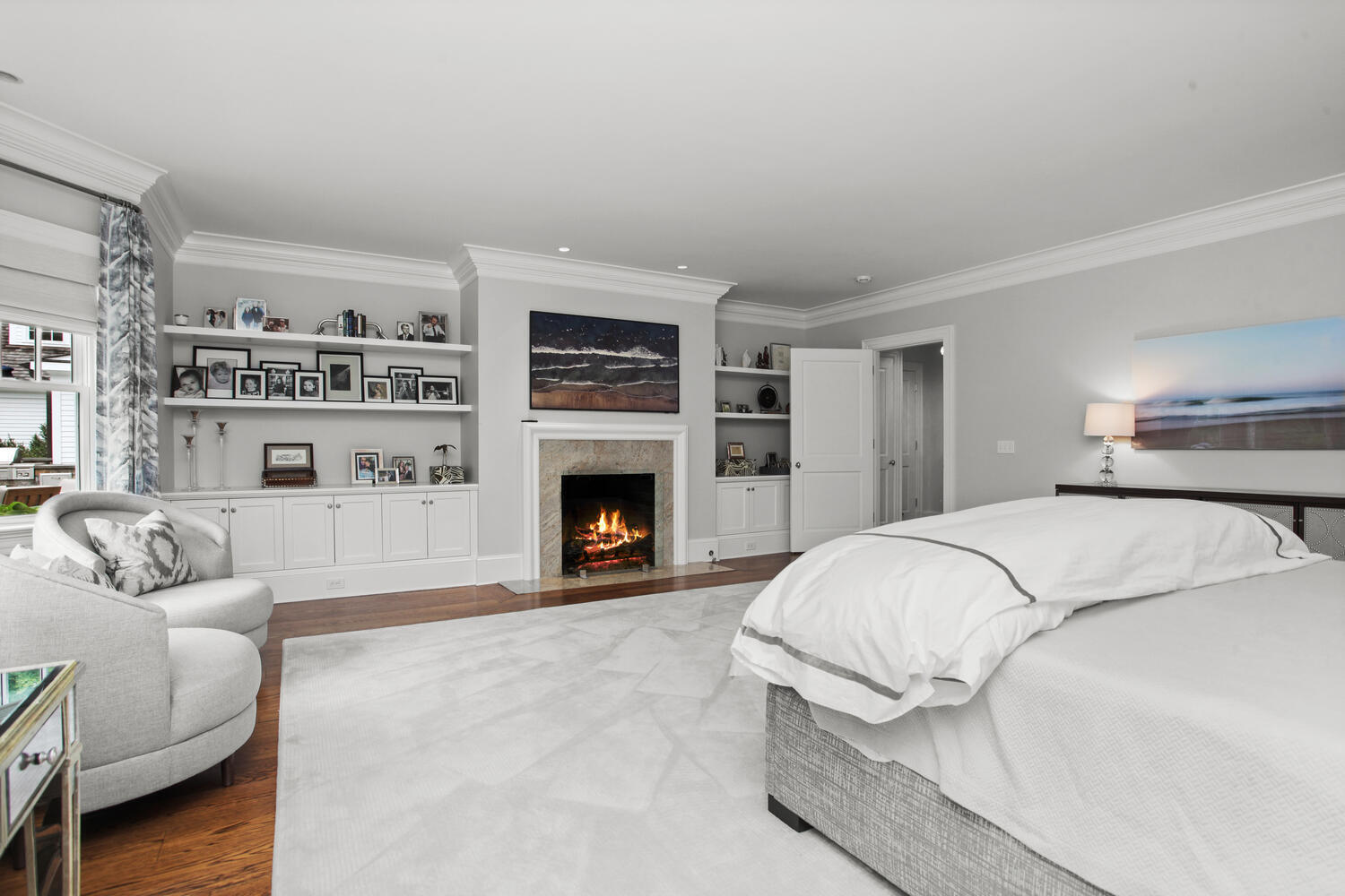3 Half Mile Road Darien, CT 06820 - Photo 22 of 49 a spacious bedroom with a bed and a couch