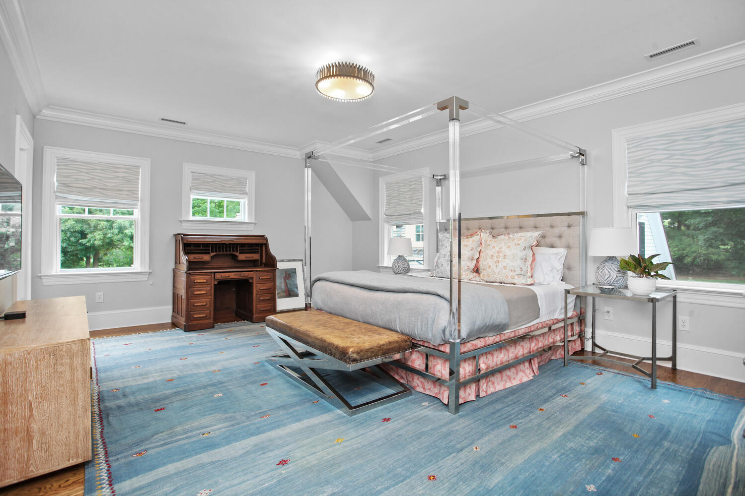 3 Half Mile Road Darien, CT 06820 - Photo 27 of 49 a spacious bedroom with a bed and a fireplace