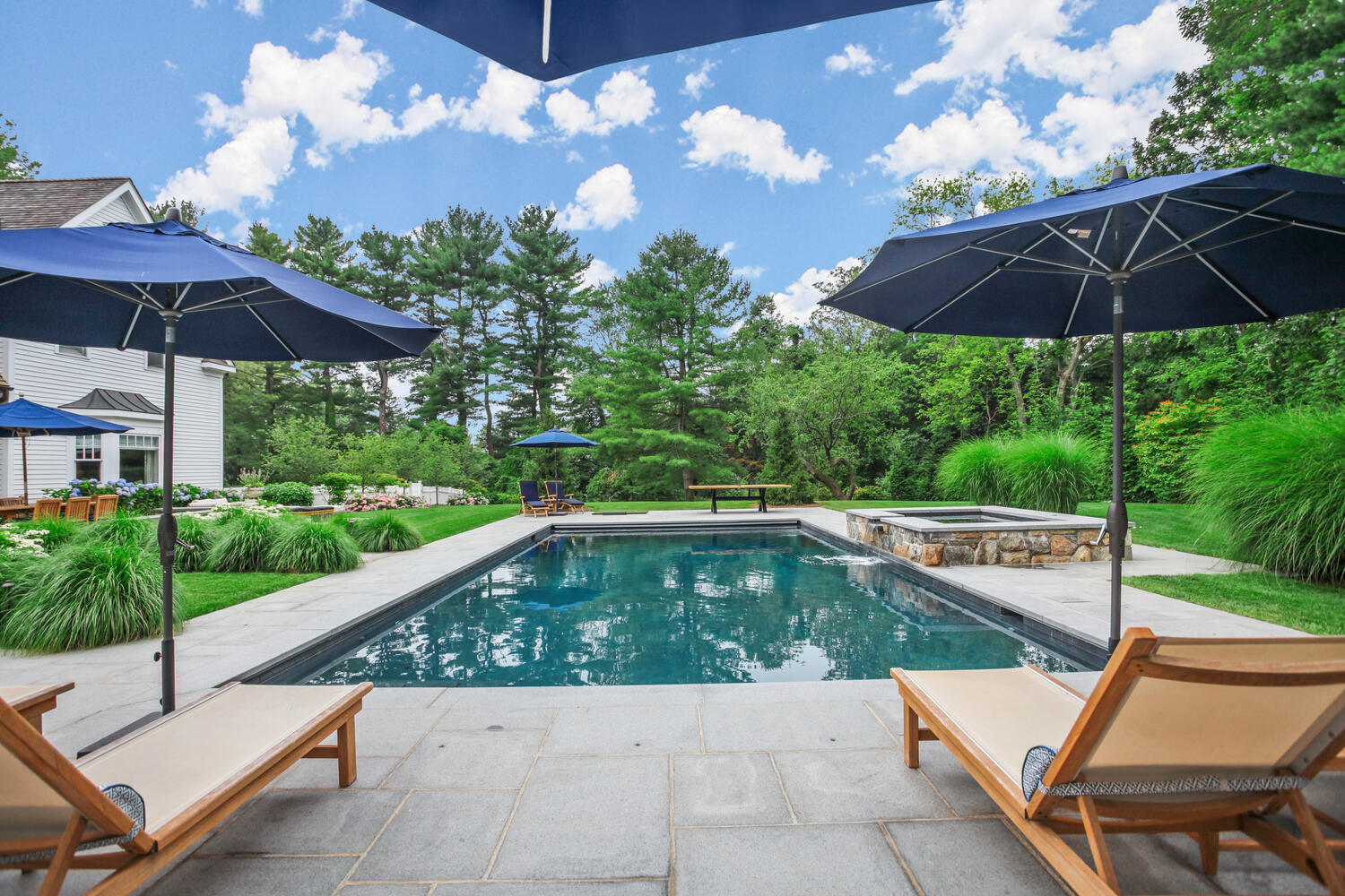 3 Half Mile Road Darien, CT 06820 - Photo 39 of 49 a view of a swimming pool with a patio