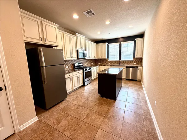 $299,000 | 7220 Wyoming Springs Drive, Unit 1302, Round Rock, TX 78681