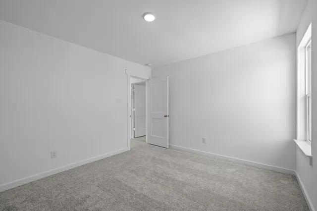 an empty room with an entryway