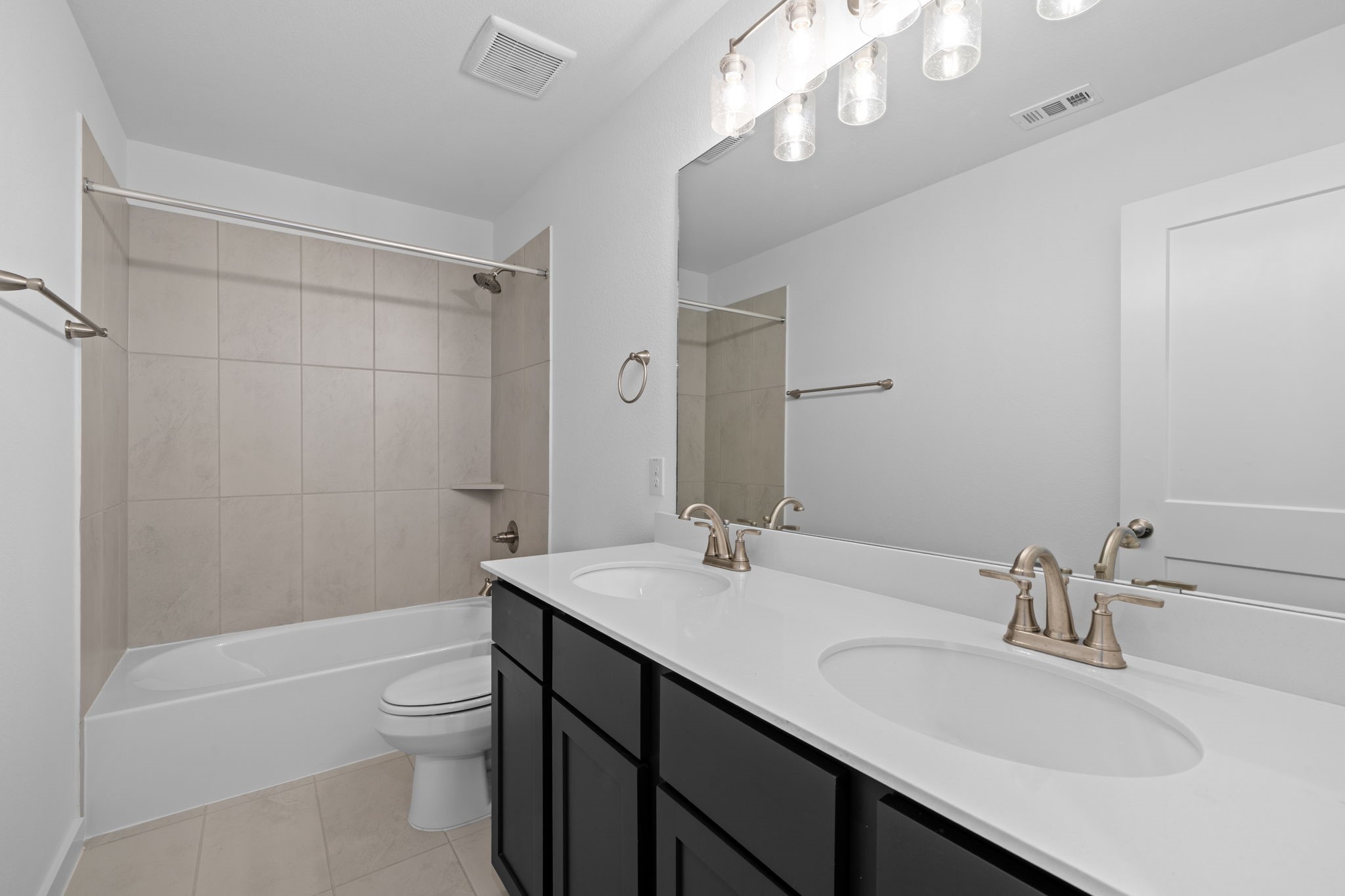 309 Gambels Quail Road Hempstead, TX 77445 - Photo 18 of 27 a bathroom with a sink a toilet and shower