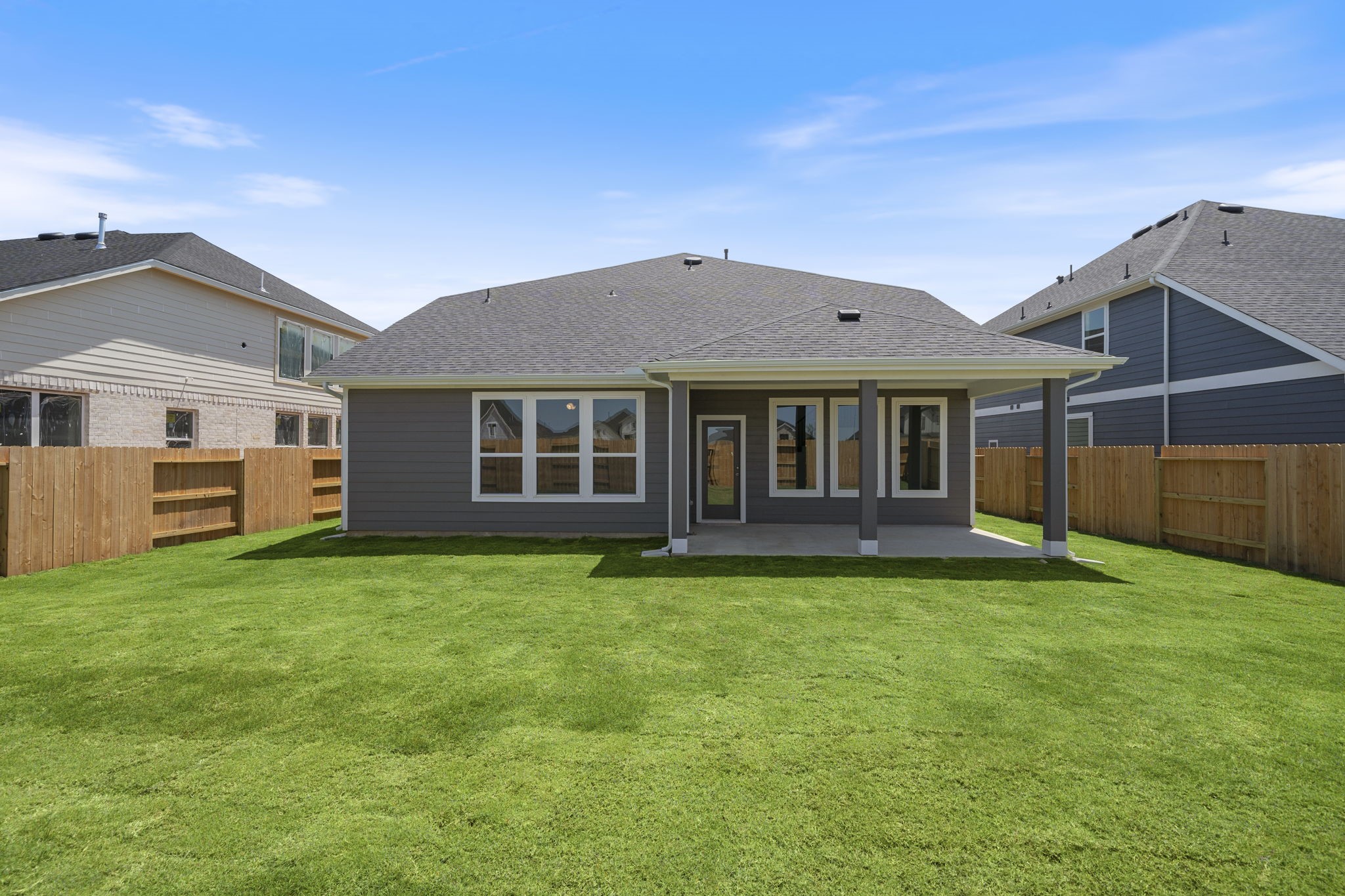 309 Gambels Quail Road Hempstead, TX 77445 - Photo 20 of 27 a backyard of a house with table and chairs