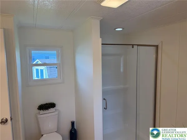 a bathroom with a toilet