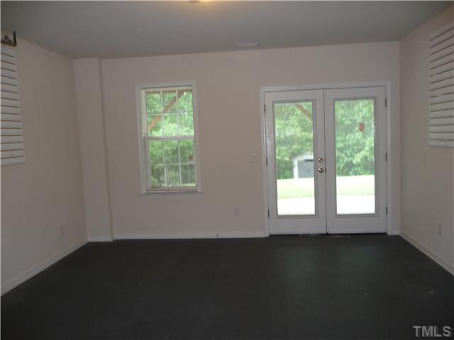 7557 Silver View Lane Raleigh, NC 27613 - Photo 17 of 25 a view of a small space with a window