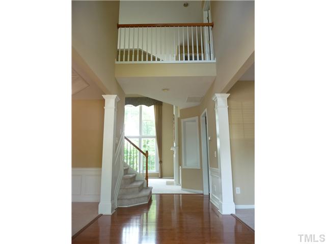 7557 Silver View Lane Raleigh, NC 27613 - Photo 3 of 25 a view of entryway with wooden floor