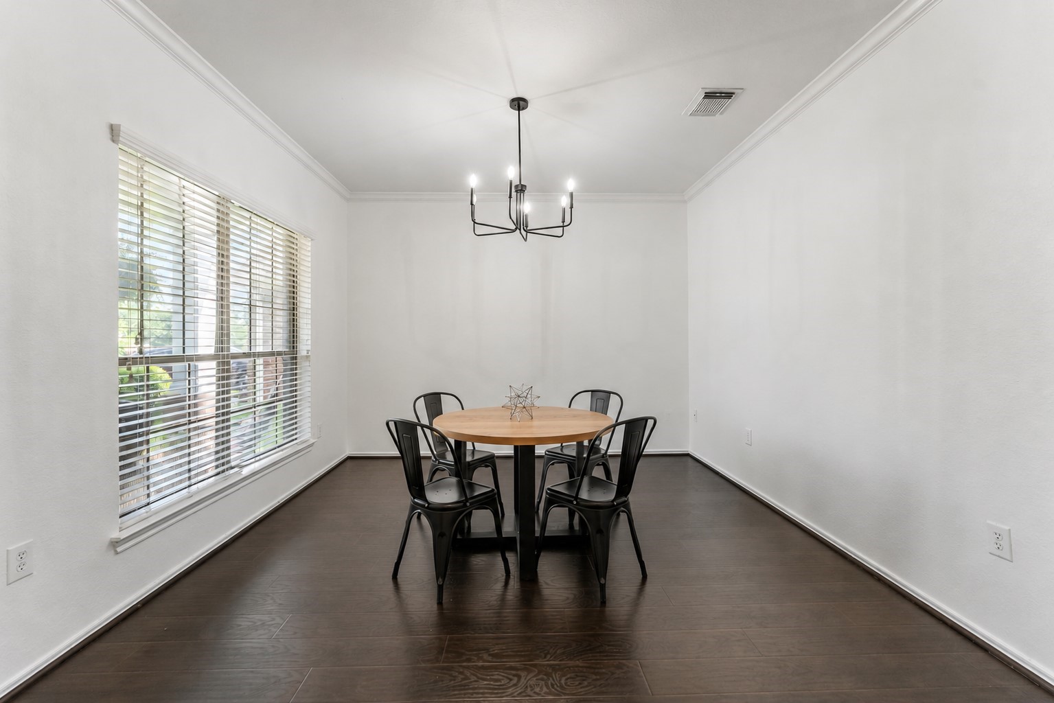 2106 Leaf Meadows Court Spring, TX 77386 - Photo 9 of 34 a view of a dining room with furniture window and wooden floor