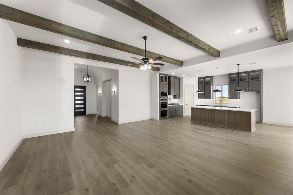 136 Evanston Court Rhome, TX 76078 - Photo 12 of 28 136 Evanston-Living Room-1