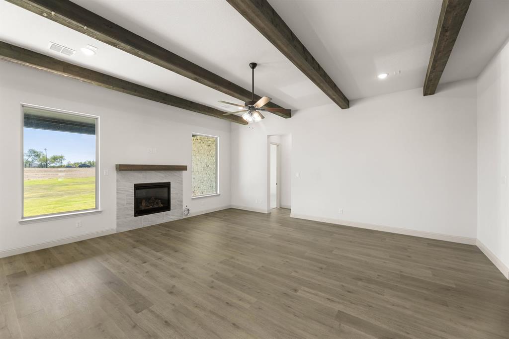 136 Evanston Court Rhome, TX 76078 - Photo 13 of 28 136 Evanston-Living Room-2