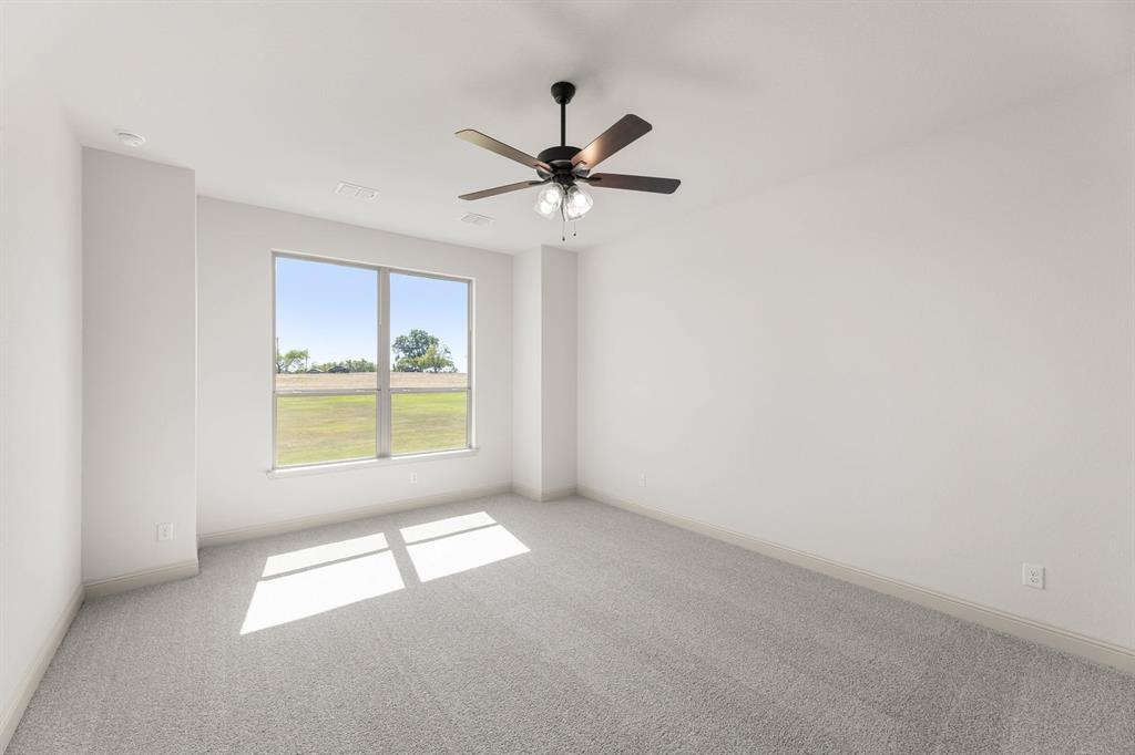 136 Evanston Court Rhome, TX 76078 - Photo 14 of 28 136 Evanston-Primary Suite-1