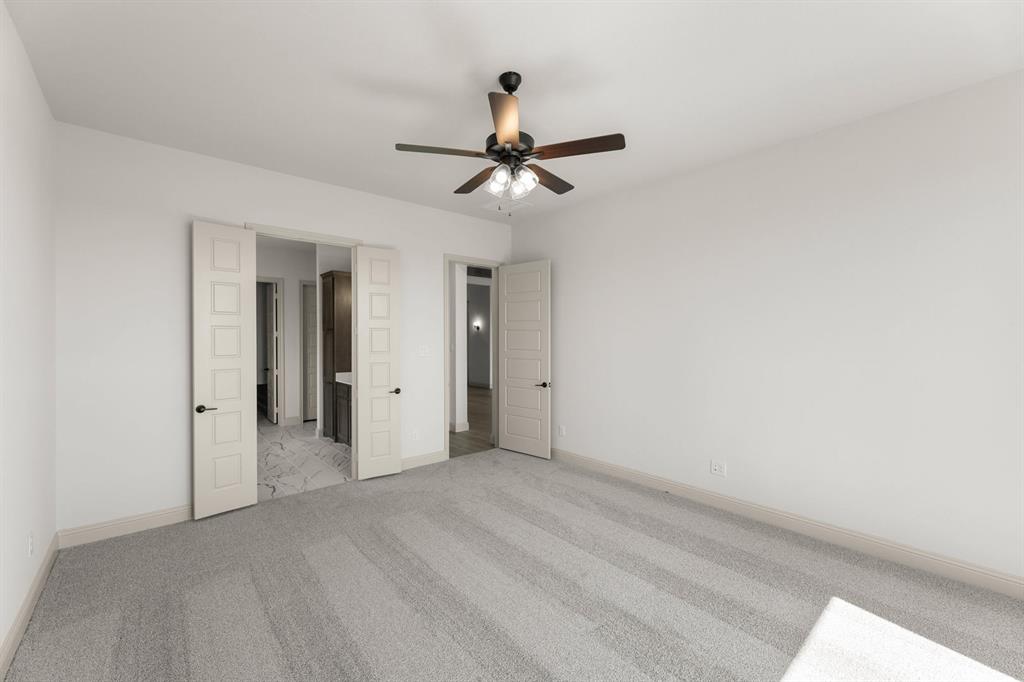 136 Evanston Court Rhome, TX 76078 - Photo 15 of 28 136 Evanston-Primary Suite-2