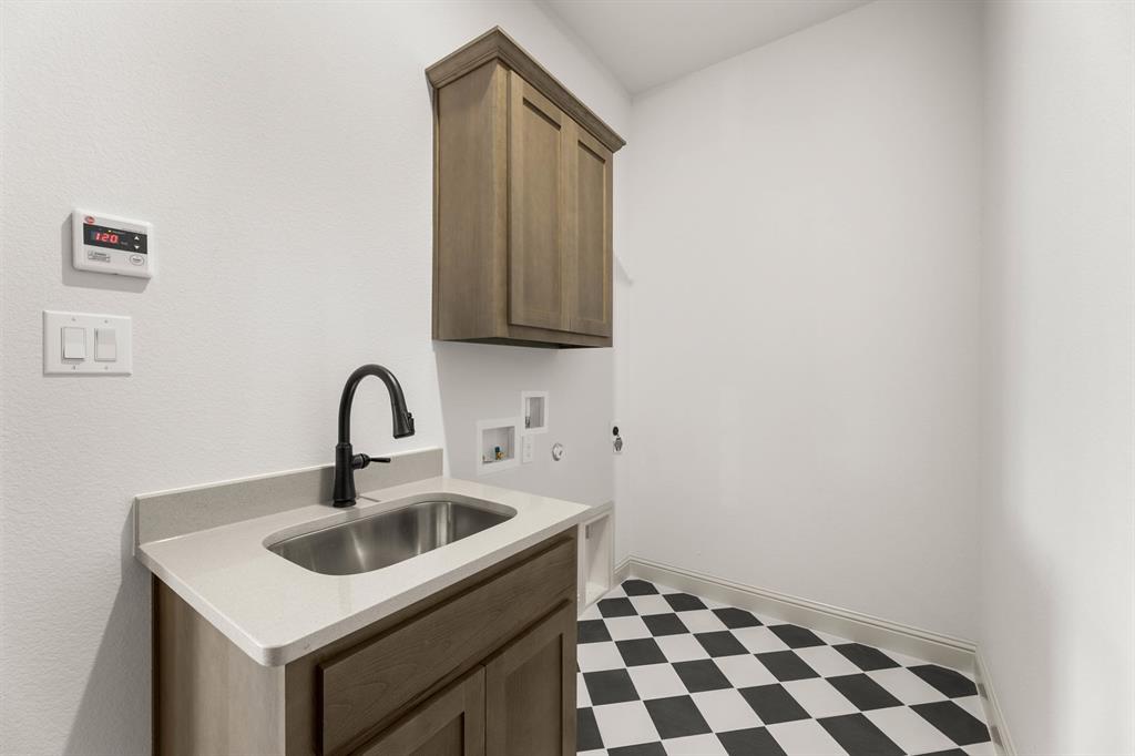 136 Evanston Court Rhome, TX 76078 - Photo 21 of 28 136 Evanston-Utility-1