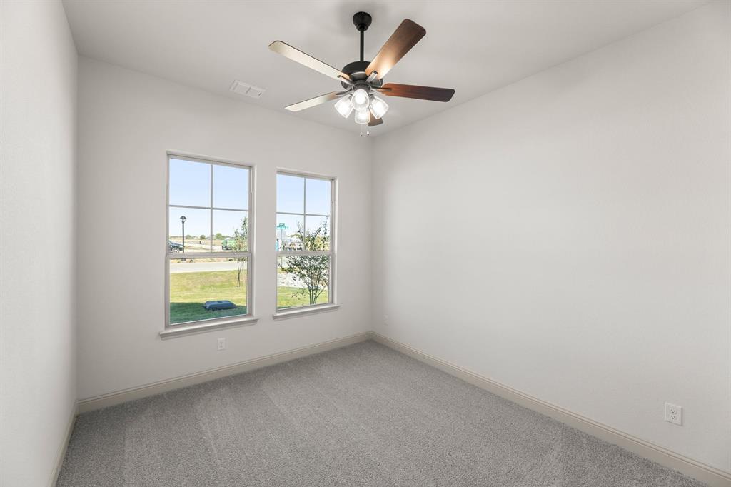 136 Evanston Court Rhome, TX 76078 - Photo 22 of 28 136 Evanston-Bedroom-1
