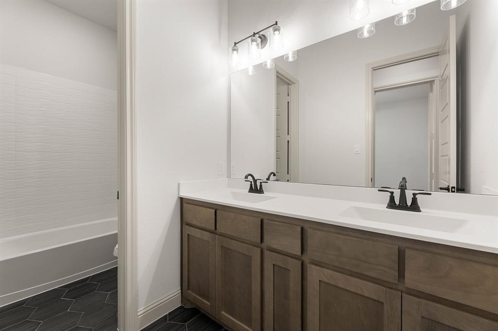 136 Evanston Court Rhome, TX 76078 - Photo 23 of 28 136 Evanston-Bathroom-1