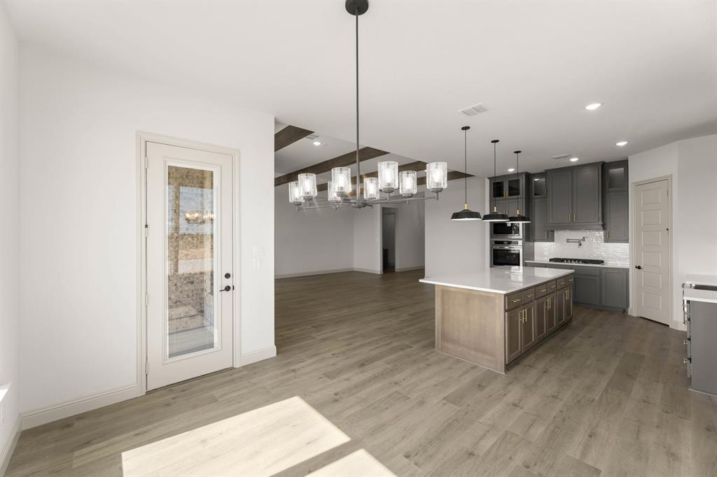 136 Evanston Court Rhome, TX 76078 - Photo 10 of 28 136 Evanston-Dining-2