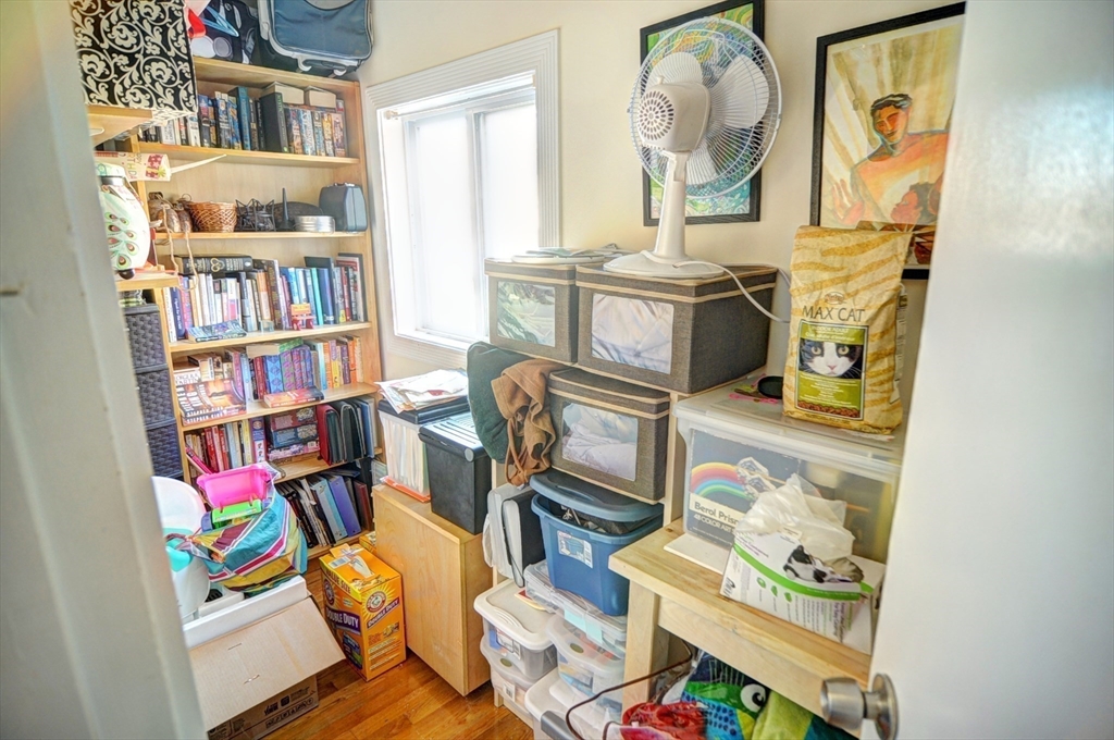 12 Braemore Road, Unit 2 Medford, MA 02155 - Photo 11 of 19 a view of a workspace with furniture and toys
