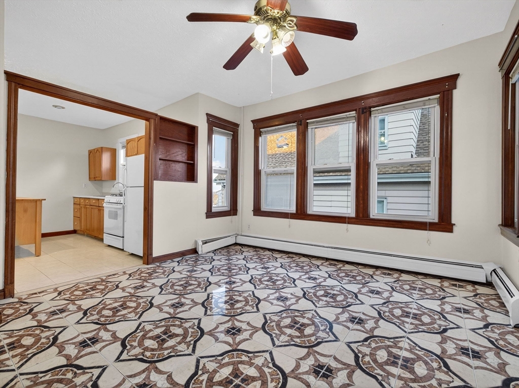 12 Braemore Road, Unit 2 Medford, MA 02155 - Photo 11 of 24 a view of a hallway with windows