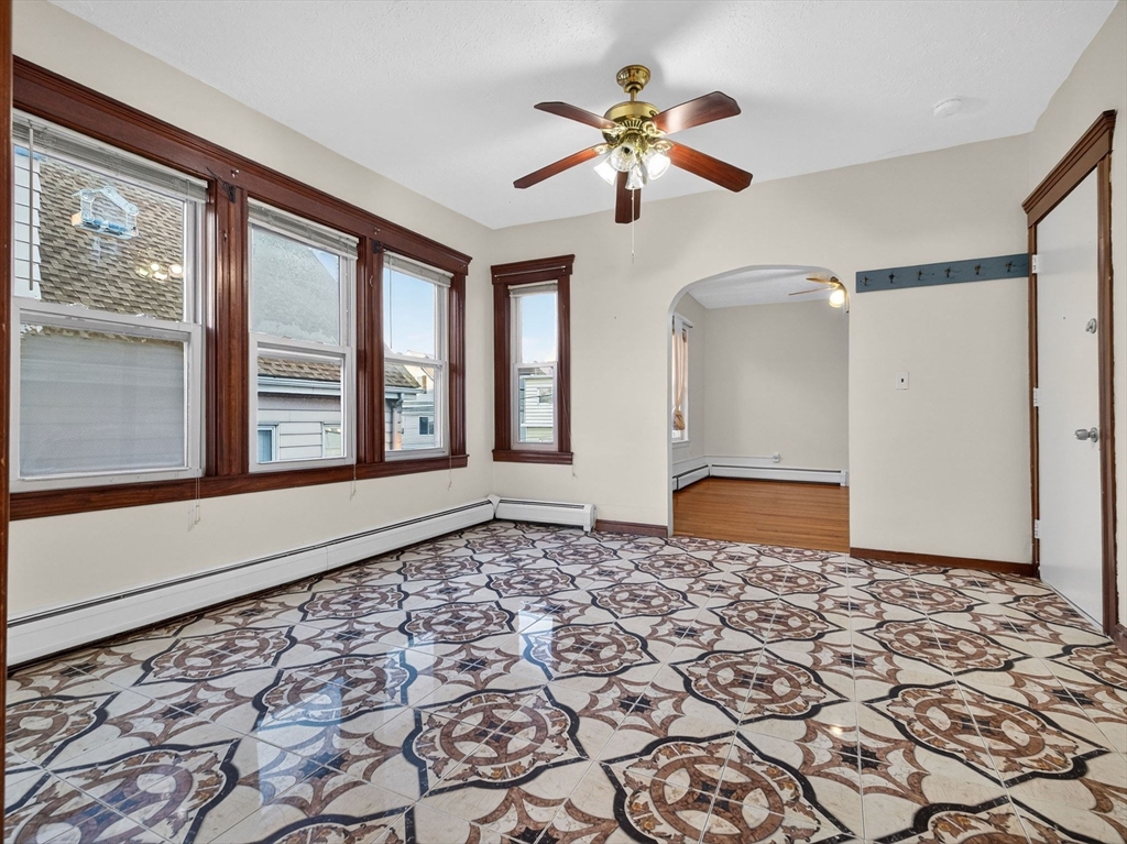 12 Braemore Road, Unit 2 Medford, MA 02155 - Photo 12 of 24 a view of an empty room and window