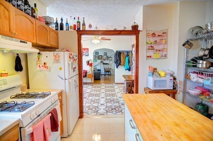 12 Braemore Road, Unit 2 Medford, MA 02155 - Photo 12 of 19 a view of living room with furniture and flat screen tv