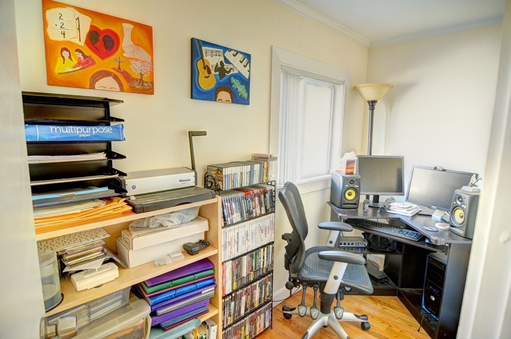 12 Braemore Road, Unit 2 Medford, MA 02155 - Photo 9 of 19 a workspace with furniture and screen