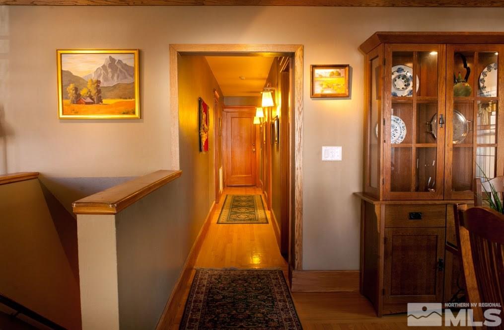 19 Winter Street Reno, NV 89503 - Photo 22 of 40 a view of a hallway with paintings on the wall
