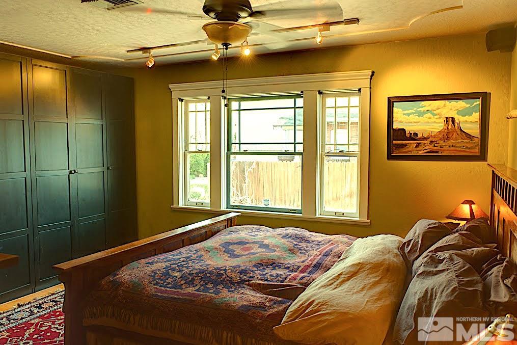 19 Winter Street Reno, NV 89503 - Photo 24 of 40 a bedroom with a bed and a window