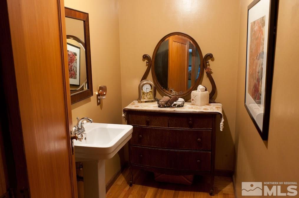 19 Winter Street Reno, NV 89503 - Photo 28 of 40 a bathroom with a sink a mirror and a vanity