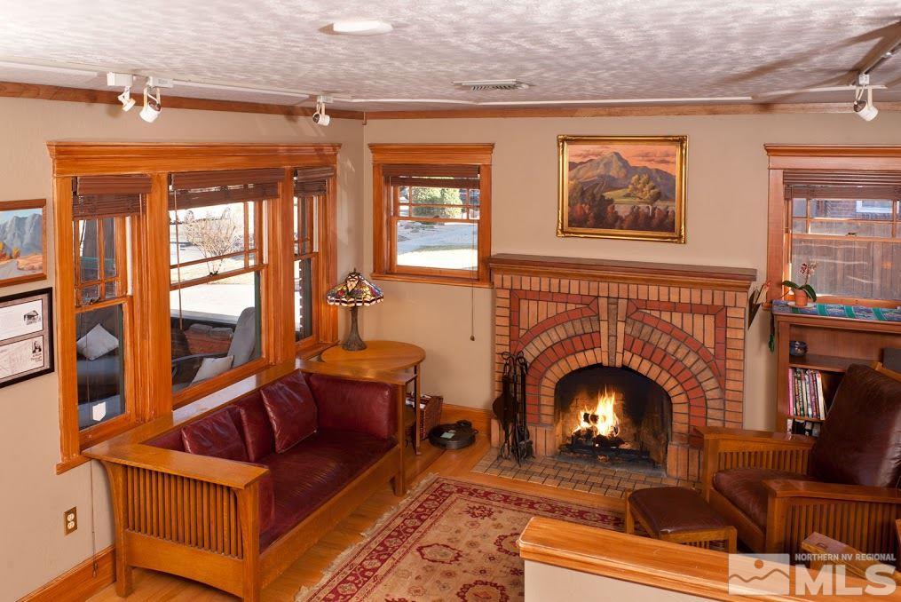 19 Winter Street Reno, NV 89503 - Photo 3 of 40 a living room with furniture and a fireplace