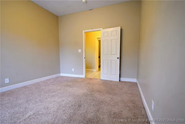 a view of balcony with wooden floor