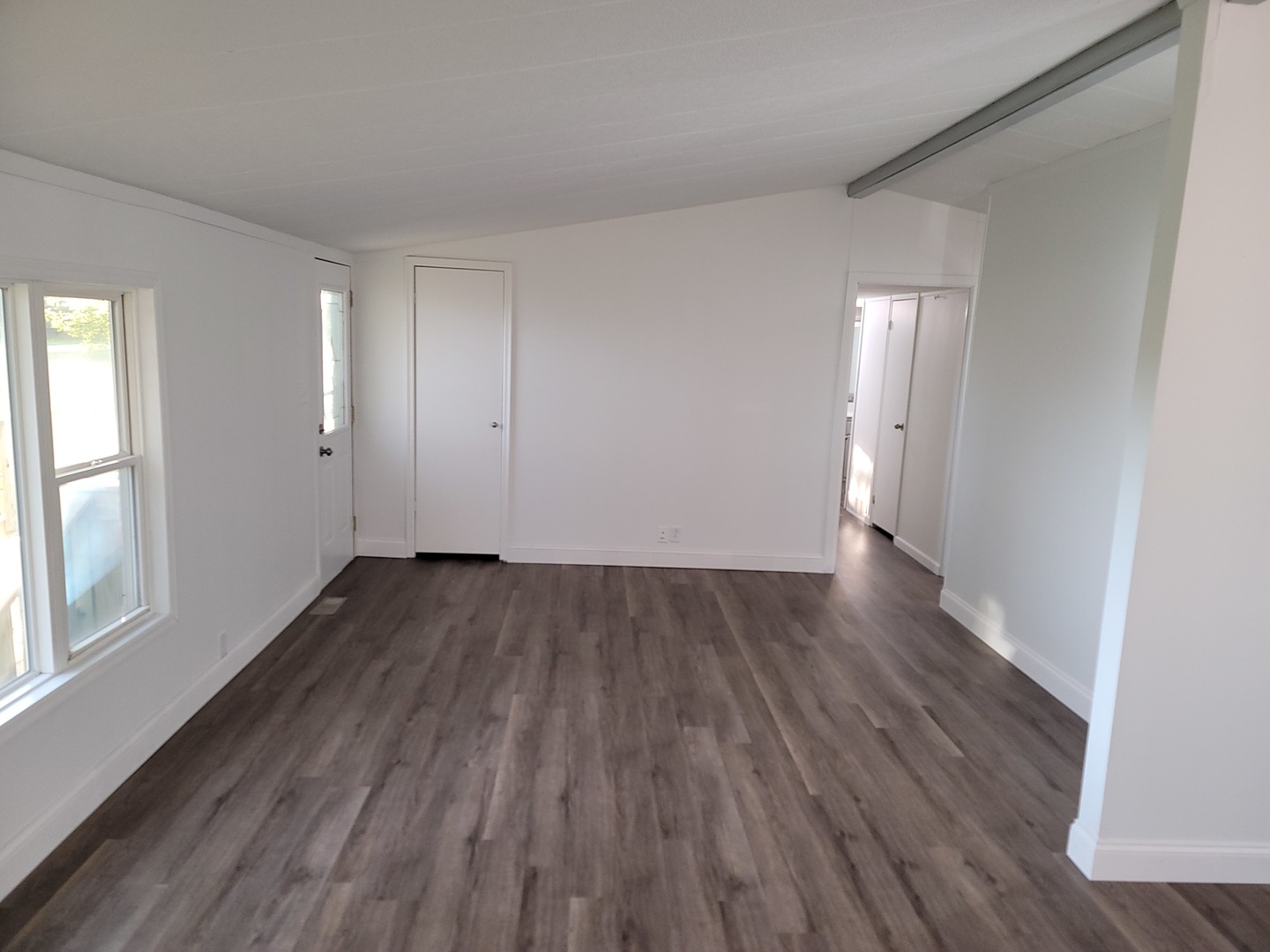 25544 Gaulrapp Road Rock Falls, IL 61071 - Photo 2 of 18 a view of a room with wooden floor and window