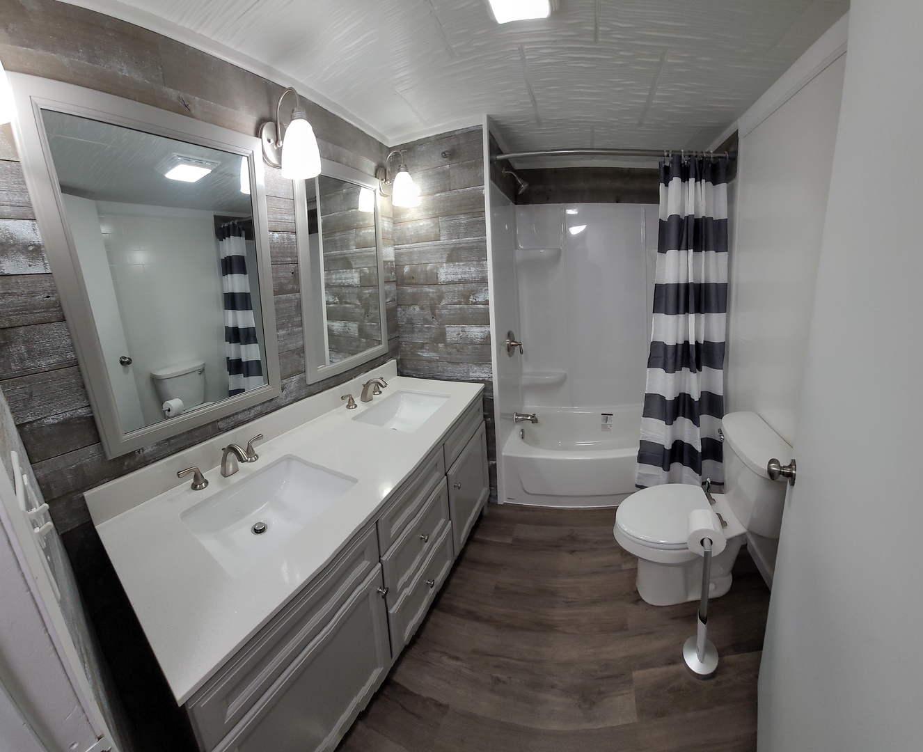 25544 Gaulrapp Road Rock Falls, IL 61071 - Photo 14 of 18 a bathroom with a double vanity sink and a mirror