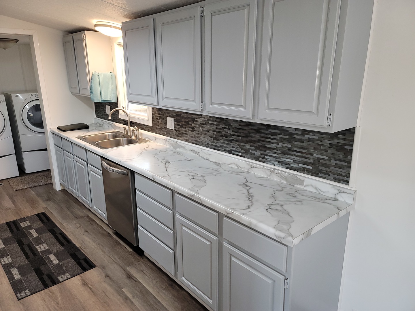 25544 Gaulrapp Road Rock Falls, IL 61071 - Photo 9 of 18 a kitchen with a sink stove and cabinets