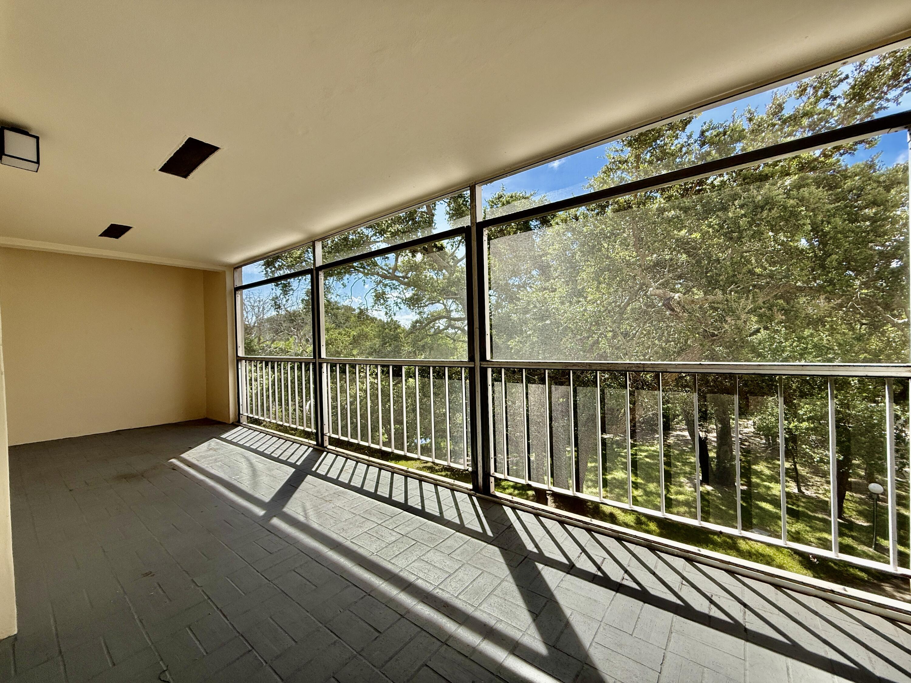 604 Northwest 13th Street, Unit 310 Boca Raton, FL 33486 - Photo 10 of 17 a view of a balcony