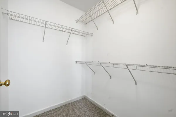 a view of a room with racks on the wall