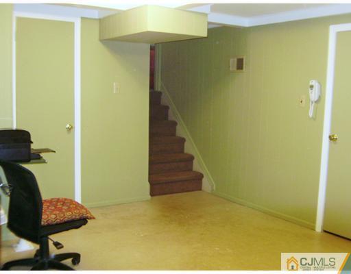 14 Barlow Road Edison, NJ 08817 - Photo 15 of 16 a view of entryway with wooden floor
