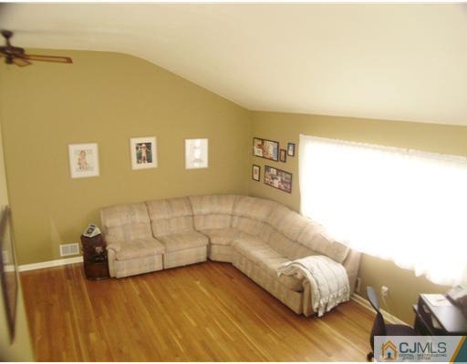 14 Barlow Road Edison, NJ 08817 - Photo 6 of 16 a living room with furniture and a couch