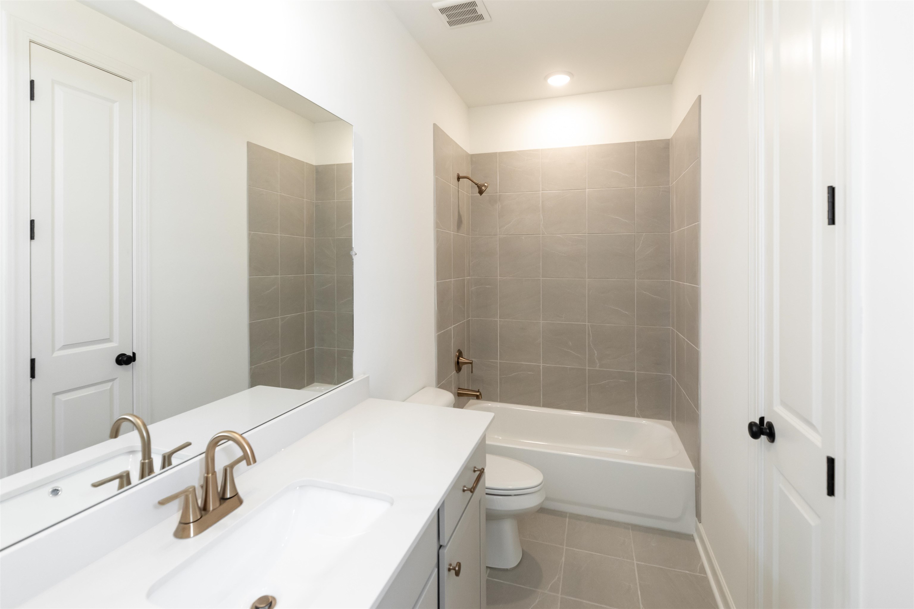 95 Misty Rdg Loop Oakland, TN 38060 - Photo 12 of 23 a bathroom with a sink a toilet and shower