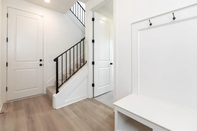 a view of a hallway with staircase