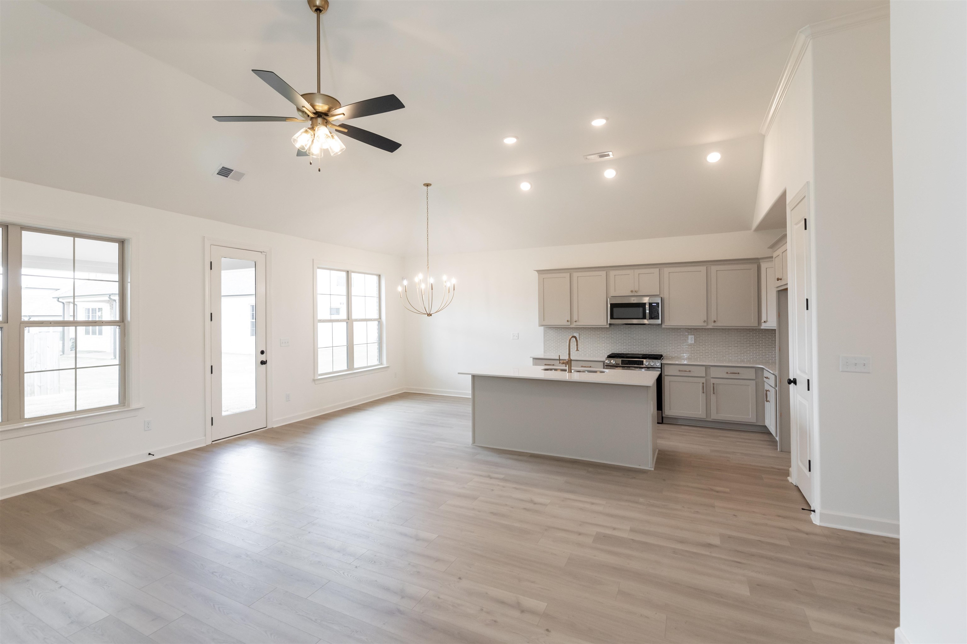 95 Misty Rdg Loop Oakland, TN 38060 - Photo 4 of 23 a view of kitchen with sink and wooden floor