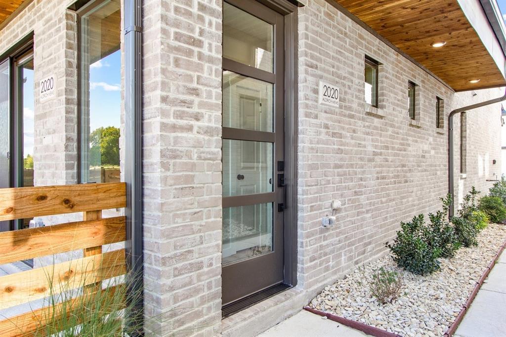 2020 Aldrich Road Celina, TX 75009 - Photo 6 of 40 a view of a brick house with a large windows