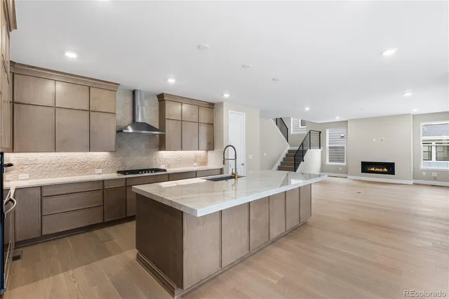 a kitchen with counter top space and appliances