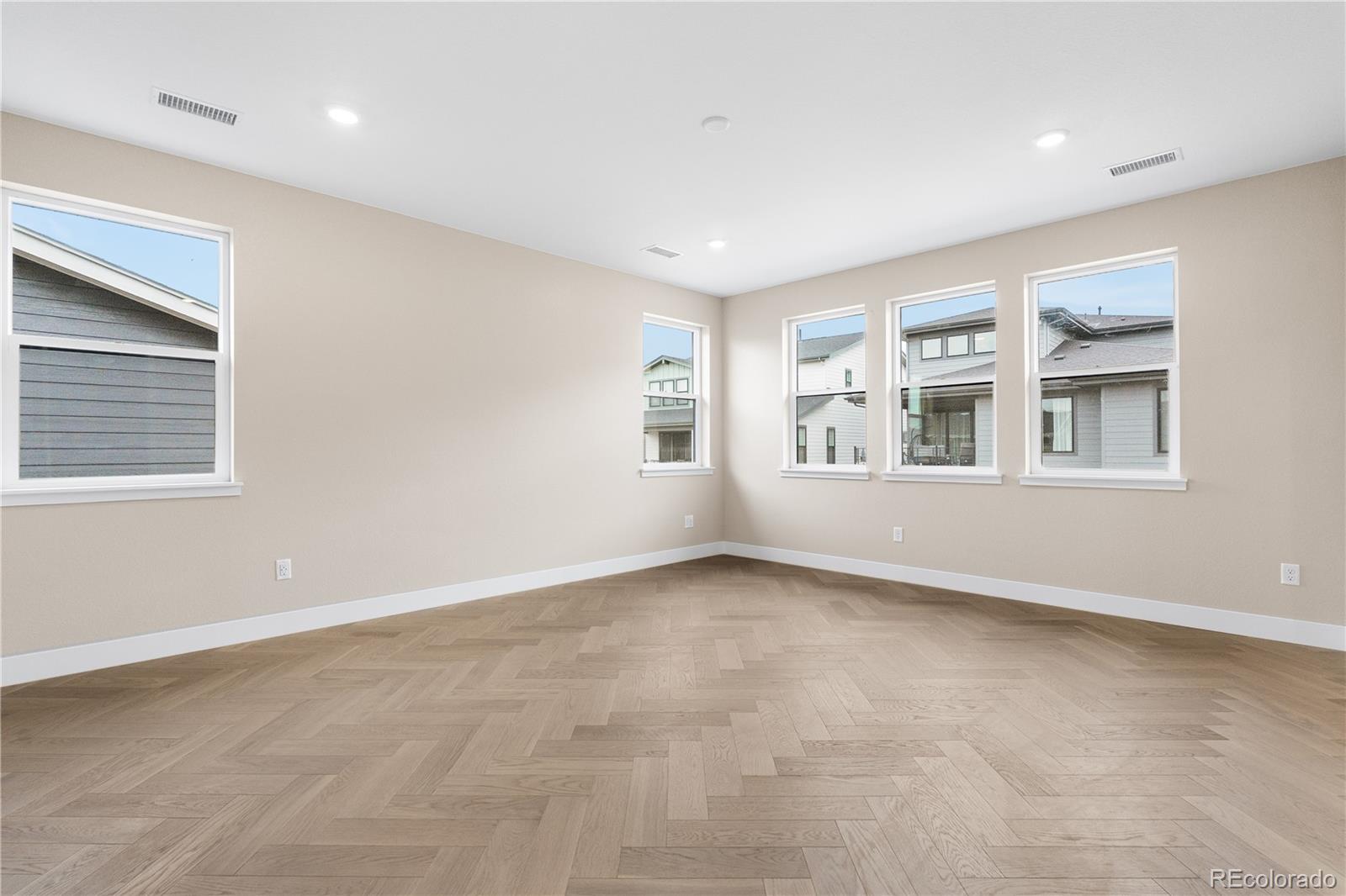 11118 Encantado Trail Lone Tree, CO 80134 - Photo 41 of 50 a view of an empty room with a window