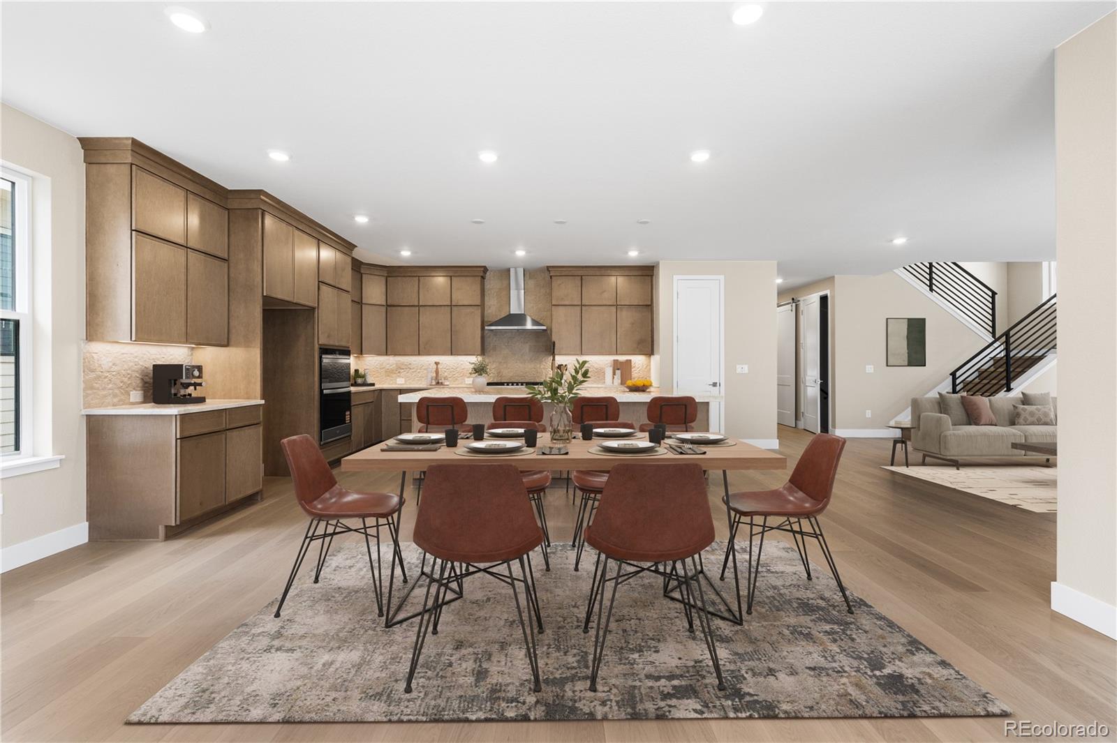 11118 Encantado Trail Lone Tree, CO 80134 - Photo 5 of 50 a view of a dining room with furniture