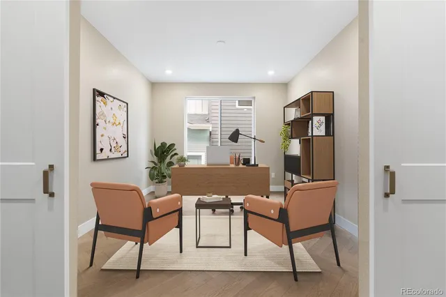 a view of a livingroom with furniture