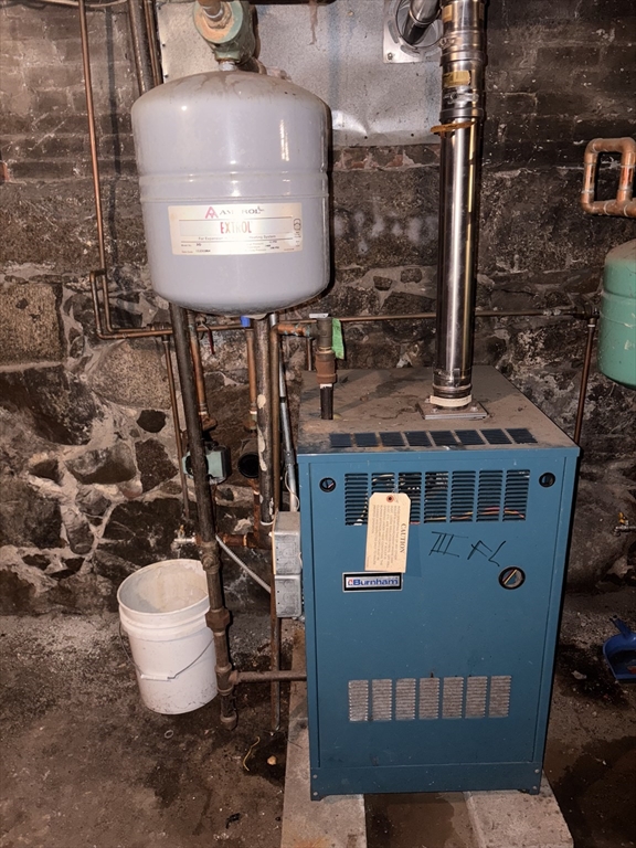 140 South Common Street Lynn, MA 01902 - Photo 4 of 10 a bathroom with a sink and mirror