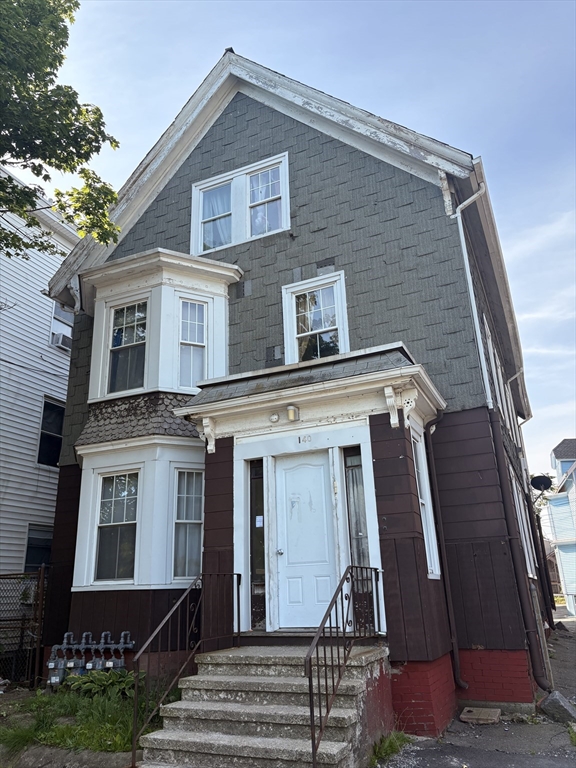 140 South Common Street Lynn, MA 01902 - Photo 8 of 10 a front view of a house