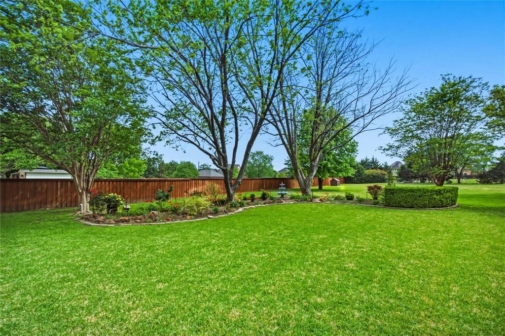 265 East Dove Road Southlake, TX 76092 - Photo 36 of 39 a view of a garden with trees