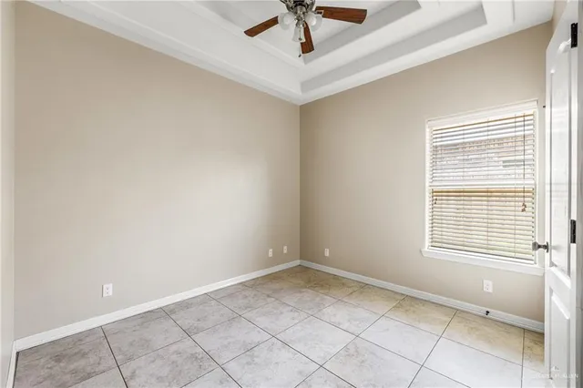 a bathroom with a granite countertop sink toilet a mirror and shower