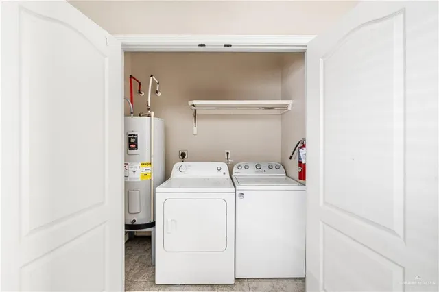 a pathway of a house with backyard and garden