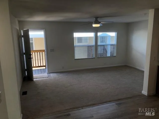a kitchen with granite countertop a stove and a sink